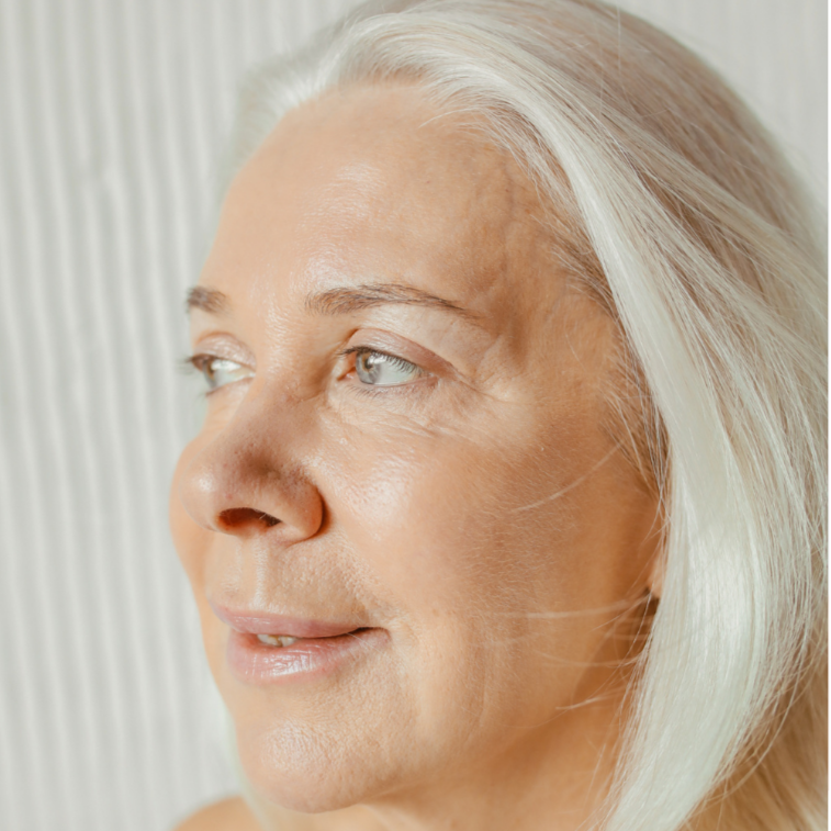 older woman with youthful face skin thanks to anti-ageing products